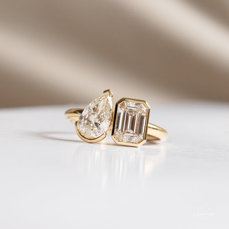 Lab Grown Diamond |  Toi et Moi Pear and Emerald Cut Ring in Bezel Set