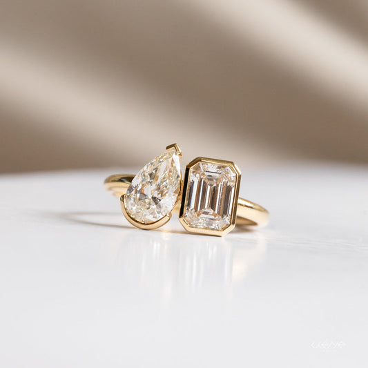 Lab Grown Diamond |  Toi et Moi Pear and Emerald Cut Ring in Bezel Set
